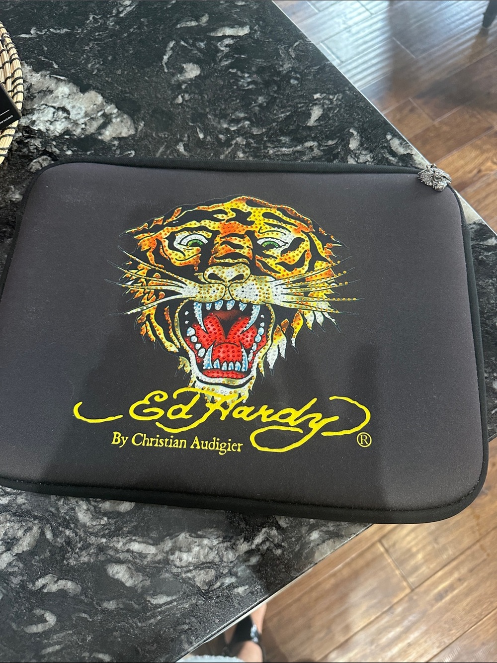 Ed Hardy by Christian Audigier tiger-print padded tablet or laptop sleeve.